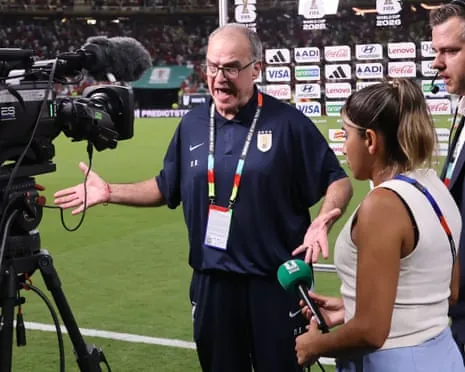 Marcelo Bielsa speaks during a flash interview after his team’s 1-0 defeat and their elimination from the tournament