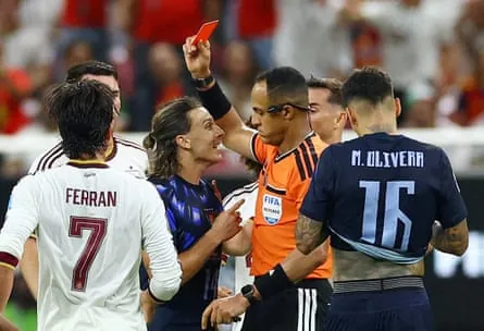Agustín Canobbio is shown a red card