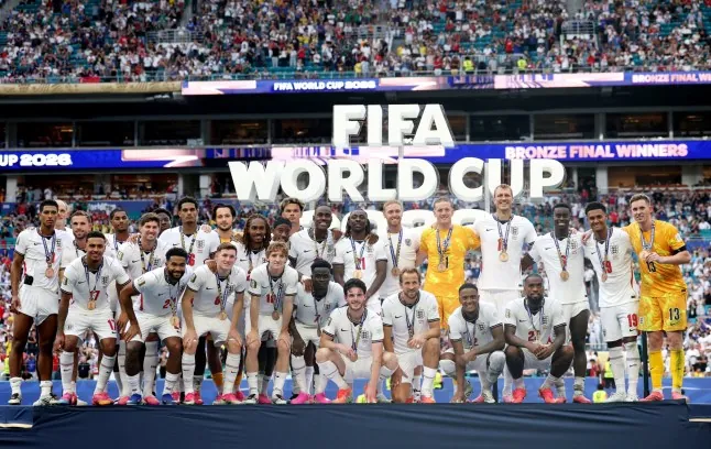 Soccer Football - FIFA World Cup 2026 - Bronze Final - France v England - Miami Stadium, Miami Gardens, Florida, U.S. - July 18, 2026 England players pose on the podium during the medal ceremony after winning the Bronze Final REUTERS/Paul Childs