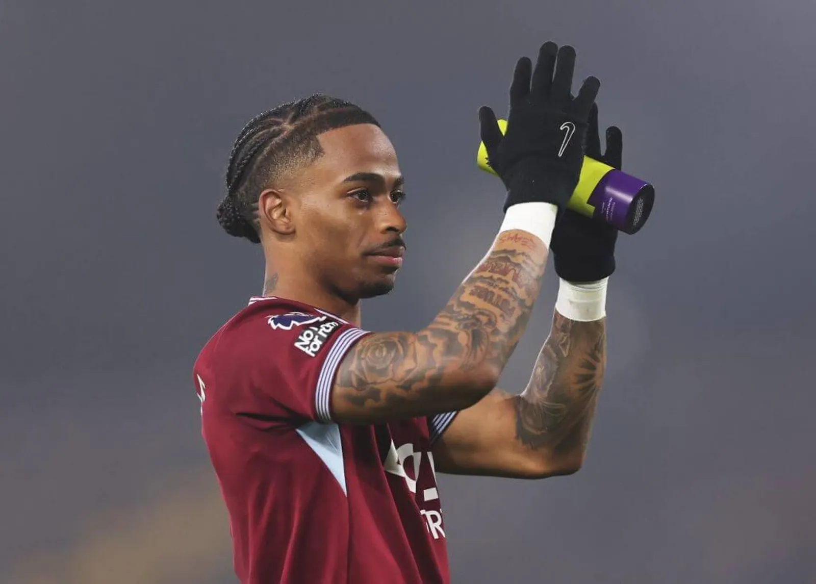 Crysencio Summerville applauds West Ham fans while holding a player of the match award