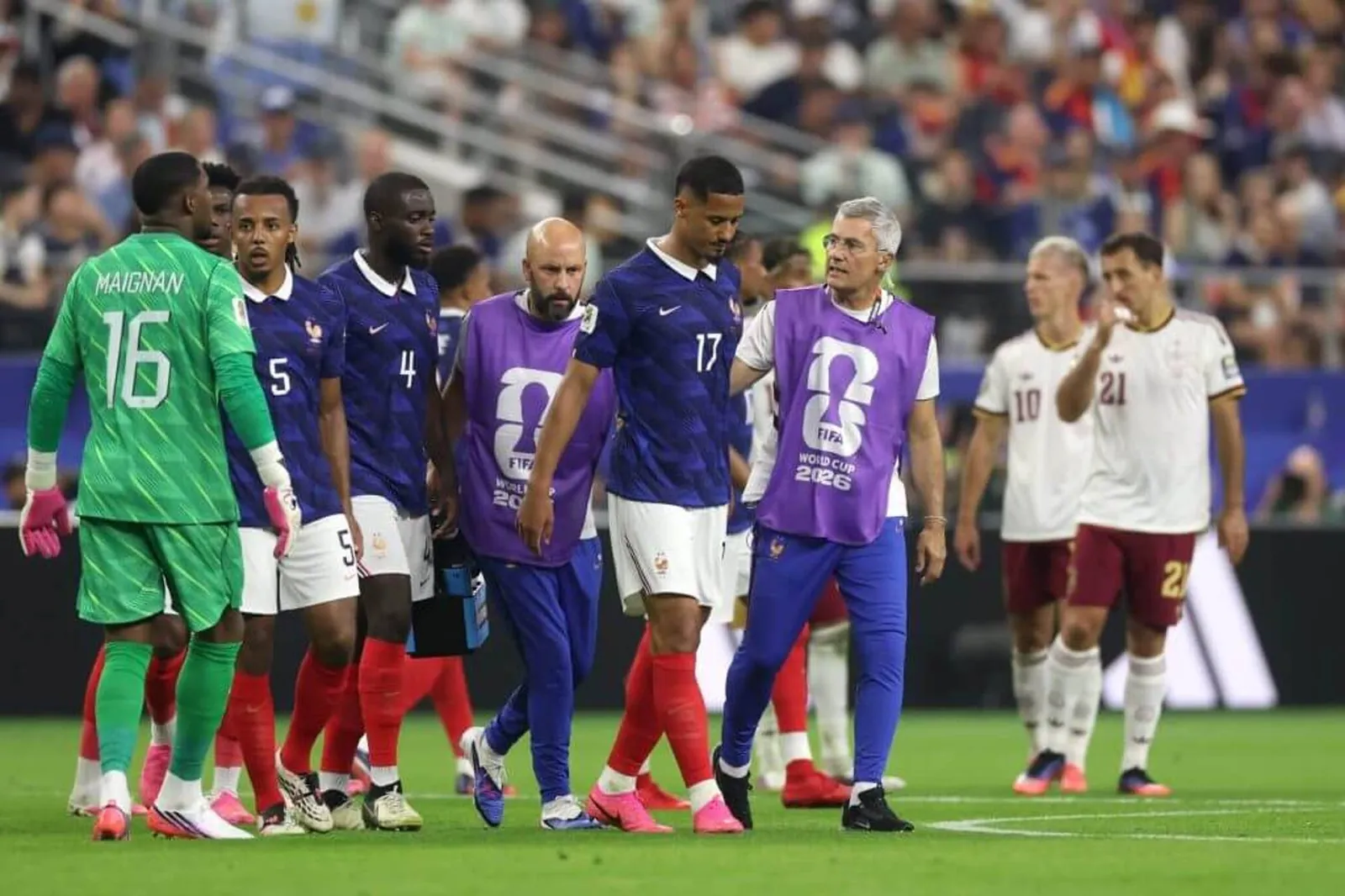 William Saliba walks off with medical staff