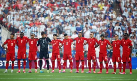 Switzerland players observer a minute’s silence in memory of South African's Jayden Adams