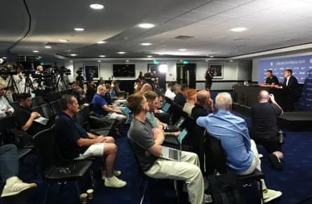 A general view of reporters and media as new Chelsea manager Xabi Alonso speaks during his official unveiling at Stamford Bridge with photos of José Mourinho and Antonio Conte holding Premier League trophies in the background